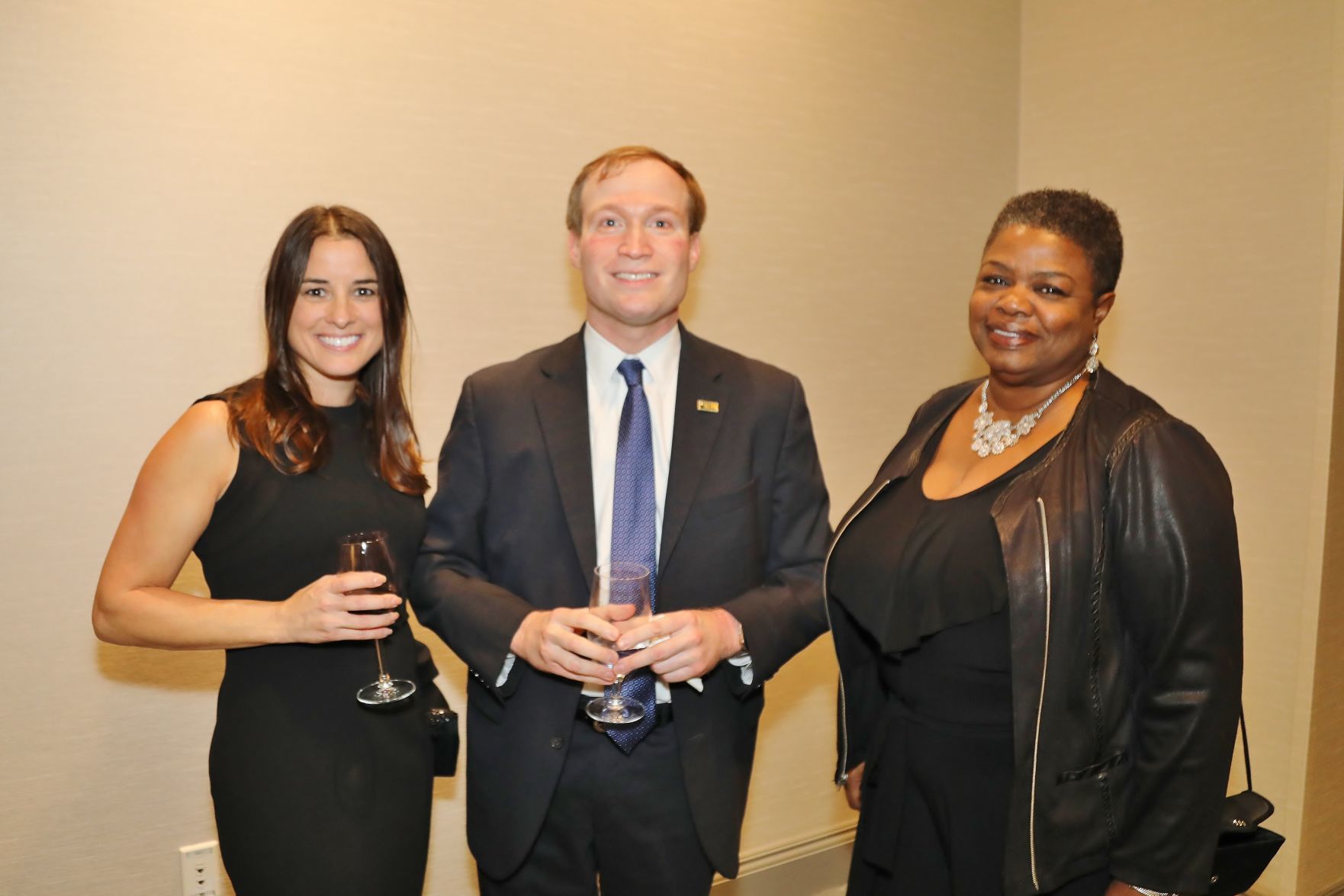 Shannon Laine, Honoree Peter Neidorff, Renee Coleman